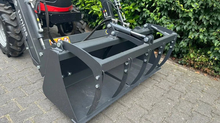 Fieldtrac 929EGT, mit Frontlader und Krokodilschaufel ab 270€ pro Monat.